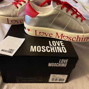 Brand new in a box love Moschino silver and red sneakers .  Size 38 (8)